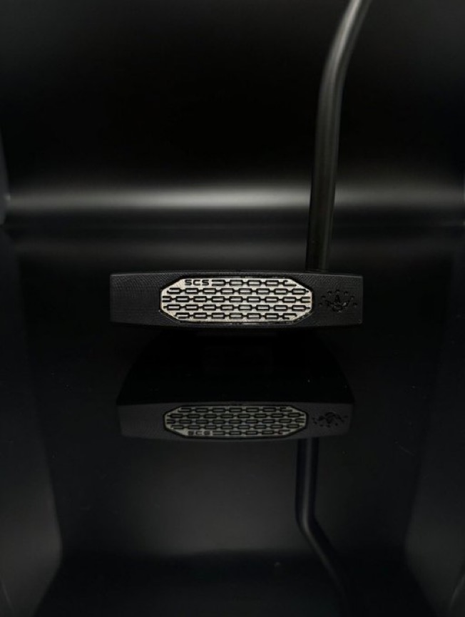 Black Scotty Cameron putter face with an octagonal milled SCS insert