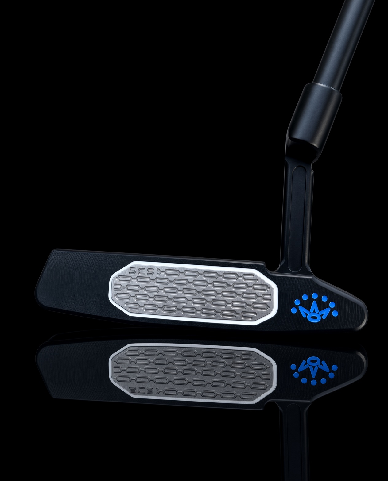 Black Scotty Cameron blade face with a silver milled insert and blue crown emblem